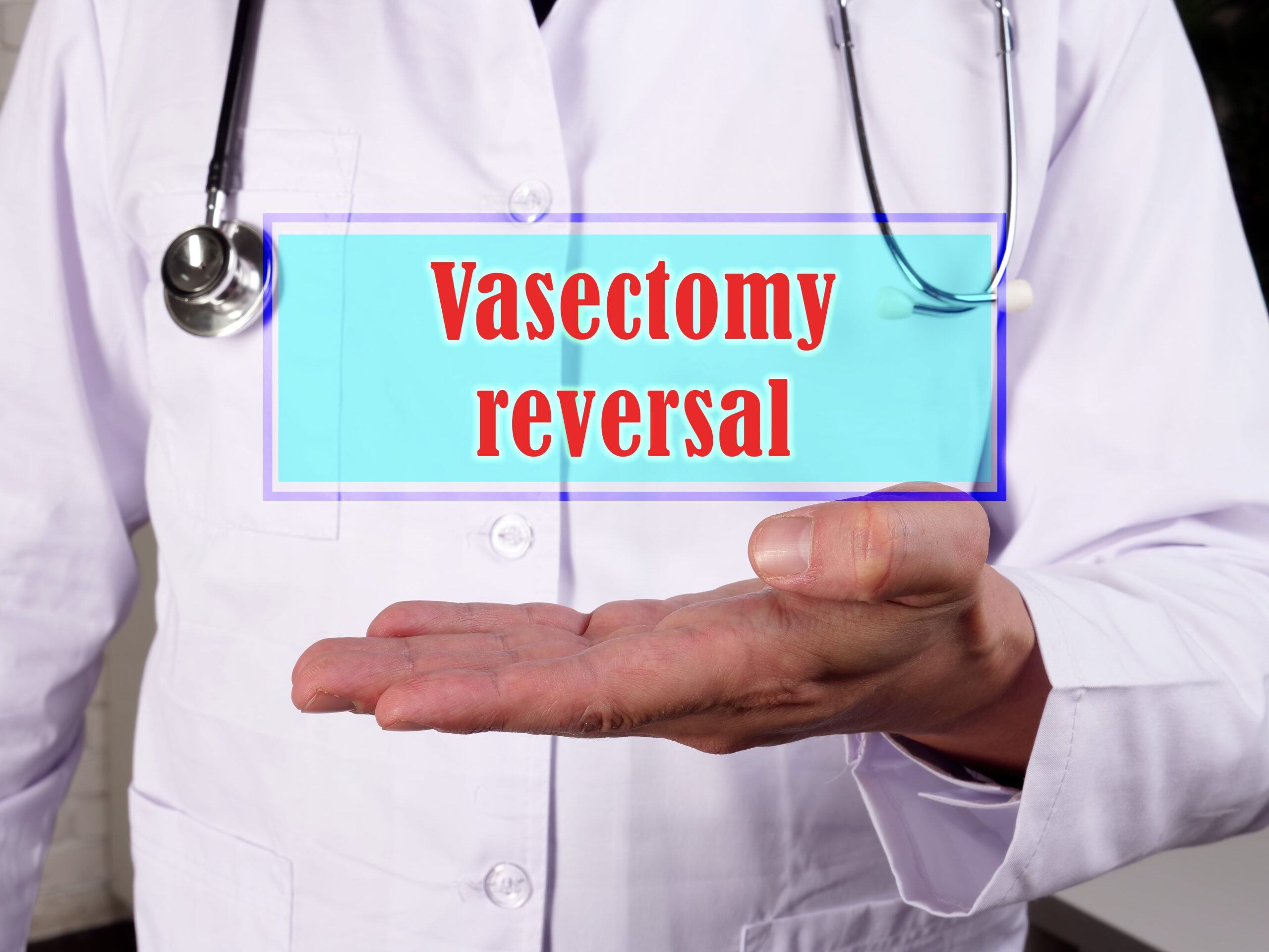 a doctor holding his hand out with words above it saying vasectomy reversal.